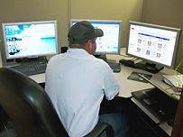 Man in Front of Computers